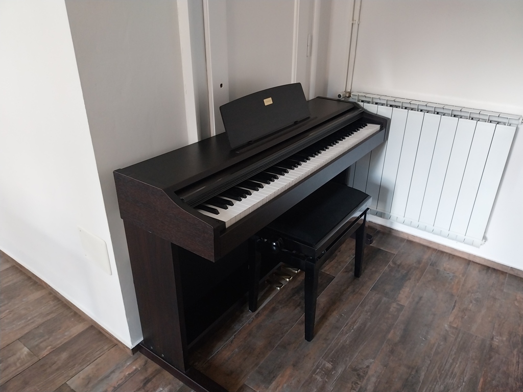 Piano at our Maribor Airbnb apartment